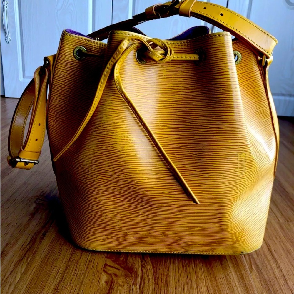 Authentic Louis Vuitton Noe Epi MM bag in canary colour